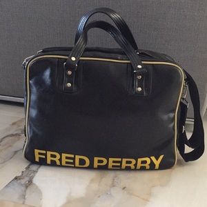 FRED PERRY BLACK/YELLOW MESSENGER BAG.